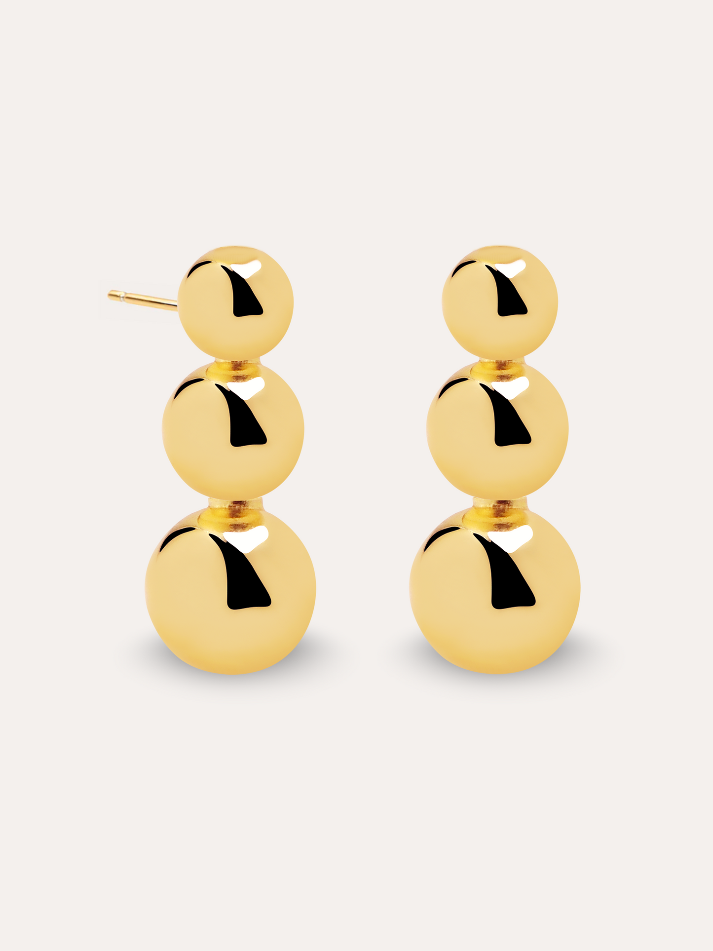 Aretes triple dot dorado PUNTO JOYERIA