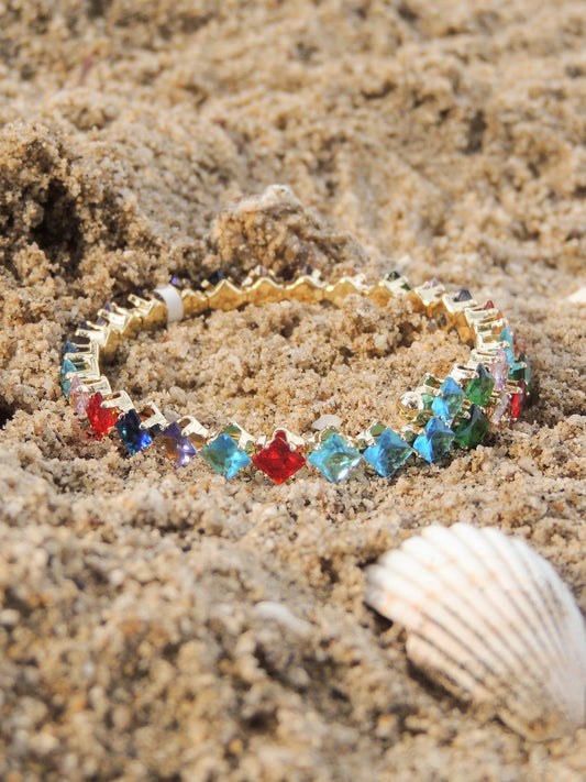 Brazalete maleable zirconias multicolor baño de oro PUNTO JOYERIA