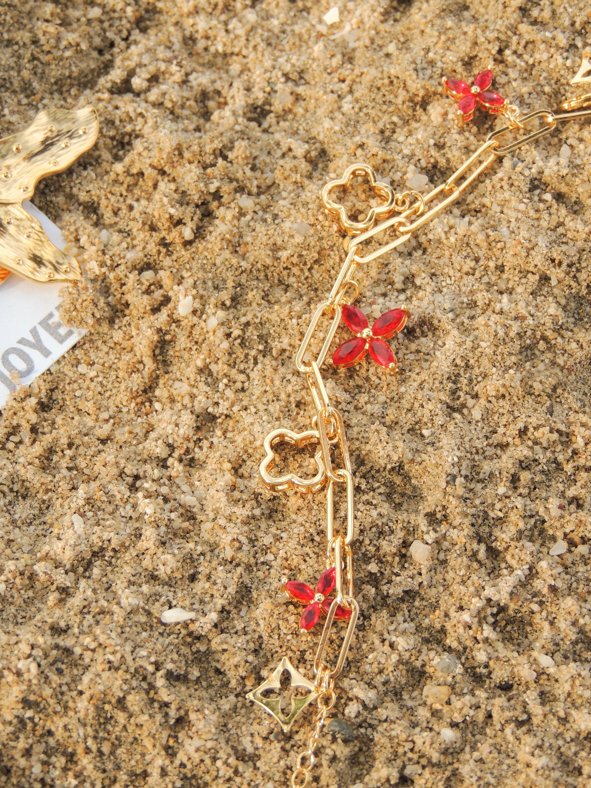 Pulsera flores zirconias baño de oro PUNTO JOYERIA