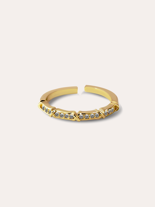 Anillo ajustable con zirconias baño de oro PUNTO JOYERIA